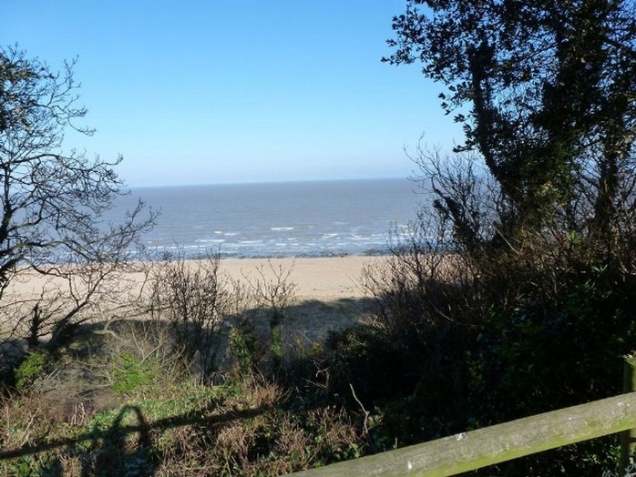 View of the beach and sea with waves
