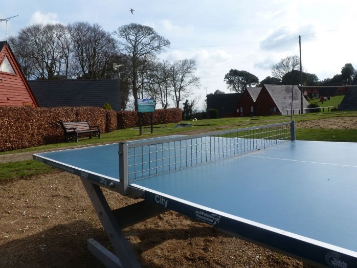 View of the table tennis table with chalets behind