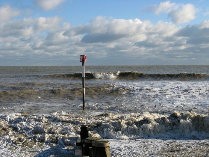 Rough sea with wave breaking offshore